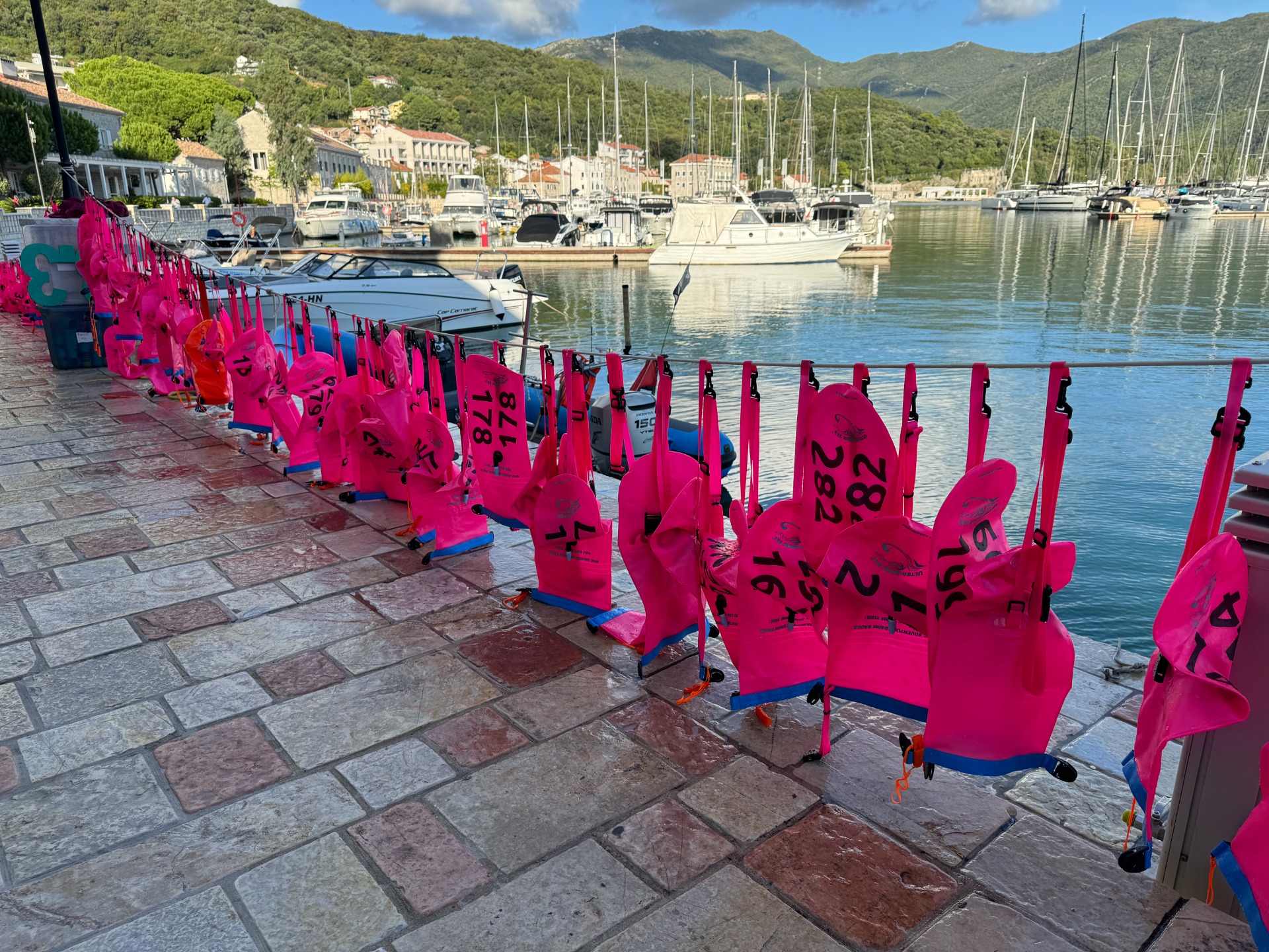 Swimmer Safety Buoy is more common also in competitions. In Ultra Swim Trackers are also used with numbered buoys.